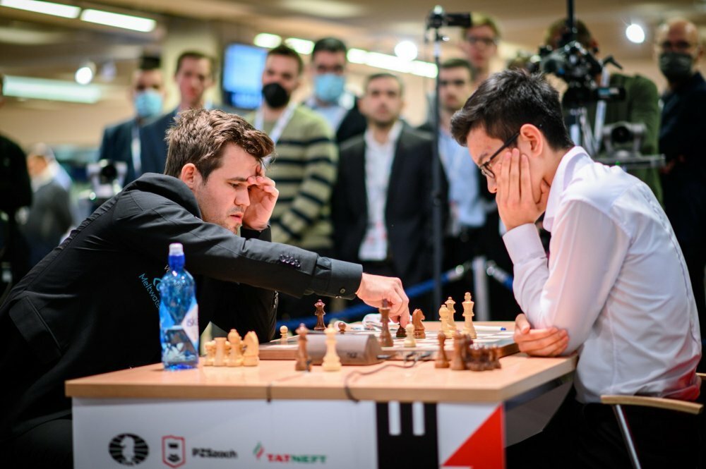 chess Karlsen Abdusattorov