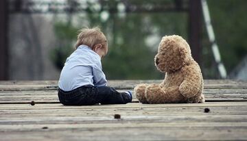 baby and a teddy