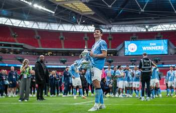 Khusanov with England cup