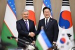Mirziyoyev va Li Chje Myon